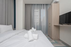 Voodi või voodid majutusasutuse Hotel Armeni toas