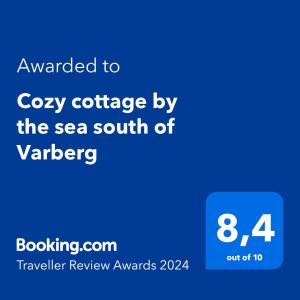 Cozy cottage by the sea south of Varberg في TrÃ¤slÃ¶vslÃ¤ge: لقطةٌ شاشة لهاتف محمول مع النص تمت ترقيته إلى كوخ مريح بجانب البحر