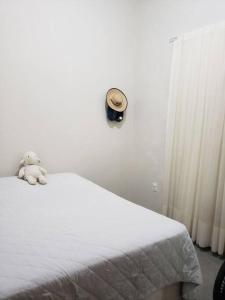 Łóżko lub łóżka w pokoju w obiekcie Casa Confortável Andar Superior