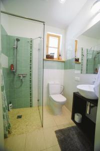 Kylpyhuone majoituspaikassa Studio apartment in private house