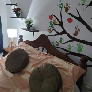 Tempat tidur dalam kamar di Temporario LEK