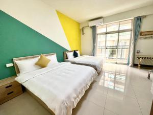 Postel nebo postele na pokoji v ubytování Banshan Yunxiu Homestay