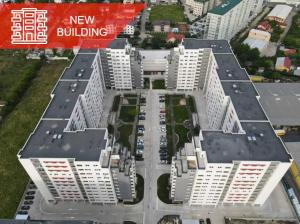 an aerial view of a city with tall buildings at Homie Studio Apartment - Private Parking - Self Check-In in Bucharest
