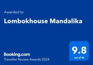 a blue sign with the words lombokswick manila at Lombokhouse Mandalika in Kuta Lombok
