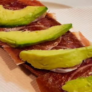 a group of slices of bread with avocado on it at Hotel La Brasa in Vélez de Benaudalla