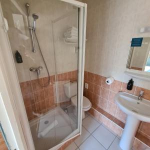 Łazienka w obiekcie Le Grand Hotel