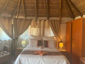 Katil atau katil-katil dalam bilik di Ubuntu Guesthouse +15 gambar