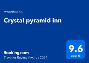 a blue screen with the text upgraded to crystals pyramiden im at Crystal pyramid inn in Cairo