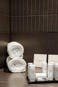 a pile of towels sitting on top of a counter at George Albert Hotel & Spa in Dorchester