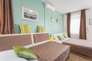 Ένα ή περισσότερα κρεβάτια σε δωμάτιο στο Villa Anitea +59 φωτογραφίες