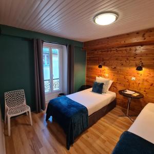 Postel nebo postele na pokoji v ubytování Le Grand Hotel + 37 fotografií