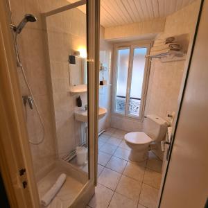 Koupelna v ubytování Le Grand Hotel