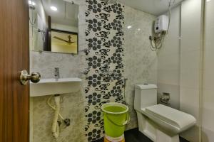 Koupelna v ubytování Hotel Guestinn Residency