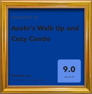 a picture frame with a sign that says walk up and cozy cordo at Azehr's Walk Up and Cozy Condo in Minglanilla