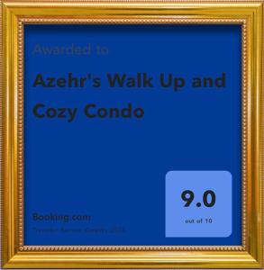 een fotolijstje met een bord dat zegt lopen en gezellige cordo bij Azehr's Walk Up and Cozy Condo in Minglanilla