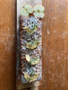 a cutting board with some food on top of it at Fischerhäuser Romanshorn in Romanshorn