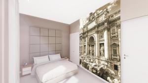- une chambre avec un lit et une peinture murale dans l'établissement Relais Badoer, à Rome