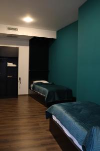 Postel nebo postele na pokoji v ubytování Prior Hotel