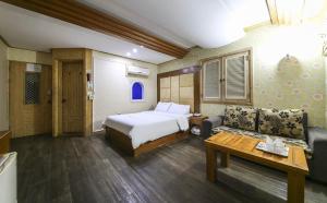 Voodi või voodid majutusasutuse Cheongju Ochang memory stay toas