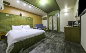 Voodi või voodid majutusasutuse Cheongju Ochang memory stay toas