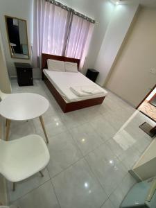 Postel nebo postele na pokoji v ubytování Phong Lan Guesthouse