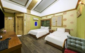 Voodi või voodid majutusasutuse Cheongju Ochang memory stay toas
