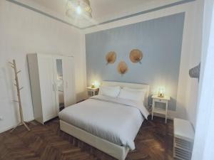 Posteľ alebo postele v izbe v ubytovaní AZZURRA Ridi Che Ti Passa