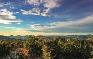 a view of the mountains from the top of a hill at Cozy Home In Neoric With House A Panoramic View in Neorić