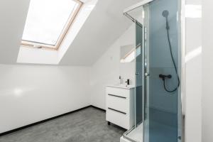 Koupelna v ubytování Apartmány Modřany + 13 fotografií
