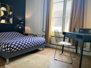 En eller flere senge i et værelse på Le Gatsby