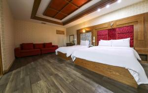 Voodi või voodid majutusasutuse Cheongju Ochang memory stay toas