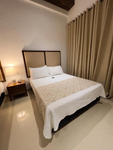 Postel nebo postele na pokoji v ubytování Hotel Dorado Plaza Centro Histórico