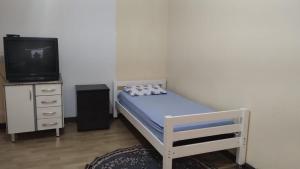 Ένα ή περισσότερα κρεβάτια σε δωμάτιο στο Casa de hóspedes 436