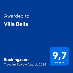 Ett certifikat, pris eller annat dokument som visas upp på Villa Bella