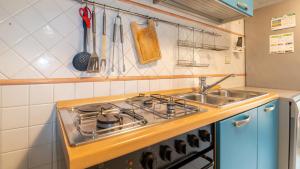 Virtuvė arba virtuvėlė apgyvendinimo įstaigoje Welcomely - Villino Octagon