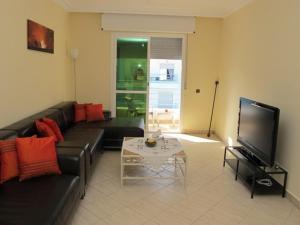TV a/nebo společenská místnost v ubytování Apartment Martil