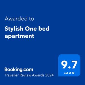a blue screen with the text awarded to akritkrit one bed apartment at Stylish One bed apartment in Inverness