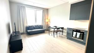 אזור ישיבה ב-Brand new and modern apartment in Oslo center