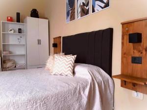 Ένα ή περισσότερα κρεβάτια σε δωμάτιο στο PH tipo casa con Patio - Palermo Hollywood - A cuadras de Santa Fe y Juan B Justo