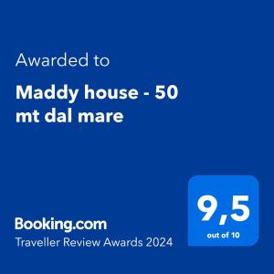 Ett certifikat, pris eller annat dokument som visas upp på Maddy house - 50 mt dal mare
