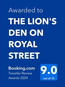 a blue sign that reads awarded to the lions den on royal street at THE LION'S DEN ON ROYAL STREET in Gourock