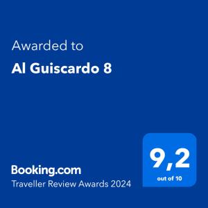 a blue screen with the text awarded to a guatemala traveler review awards at Al Guiscardo 8 in Bari