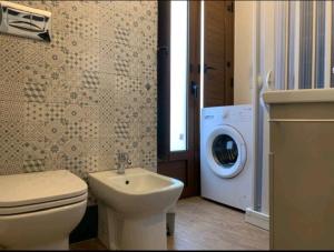 Un baño de Piano di Gamez Apartments 26 fotos más