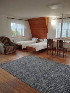 Postel nebo postele na pokoji v ubytování Kolo Druziv
