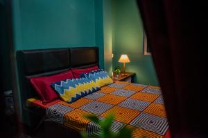 Postelja oz. postelje v sobi nastanitve Family Homestay Darjeeling
