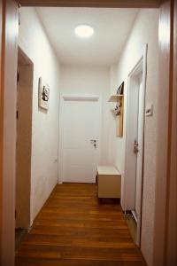 Ένα ή περισσότερα κρεβάτια σε δωμάτιο στο MIB Apartment