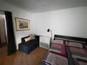Łóżko lub łóżka w pokoju w obiekcie Zentrale, ruhige Wohnung nahe Murinsel & Kunsthaus