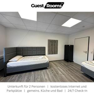 a bedroom with two beds in a room at Unterkunft für 2 - GuestRooms24 - Marl in Marl