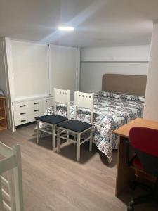 Ένα ή περισσότερα κρεβάτια σε δωμάτιο στο Las Mini Casas de José Manuel - Nº 3 Piso D