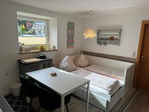 Posedenie v ubytovaní Helle Ferienwohnung Saunahaus